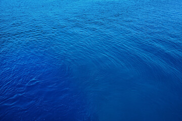 Surface of sea water with small waves at great depth