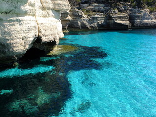 blue mediterranean sea and rocks