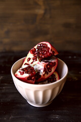 Ripe red pomegranates. Seasonal fruits. Royal fruit.