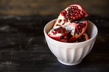Ripe red pomegranates. Seasonal fruits. Royal fruit.