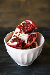 Ripe red pomegranates. Seasonal fruits. Royal fruit.