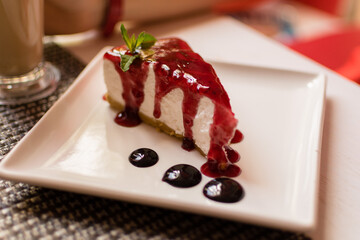 Dessert - Cheesecake with Berries Sauce and Green Mint