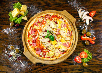 pizza top view with ingredients on wood. cooking concept