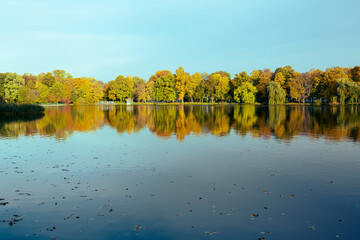 Beautiful landscape of lake with colorful trees in Autumn season 
