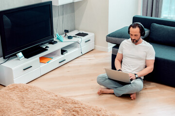 Calm man enjoying his work from home
