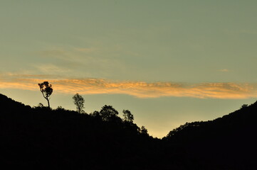 Sunset over the mountain whit orange sky