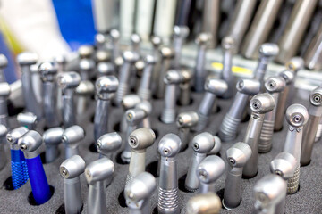 Many different metal dental turbine tips for dental treatment in dentistry.