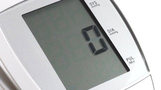 Digital blood pressure monitor tonometer in work