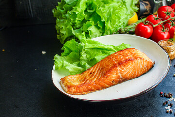 fried salmon fish bbq grill seafood portion fresh meal on the table  top view copy space for text food background rustic diet
 pescetarian