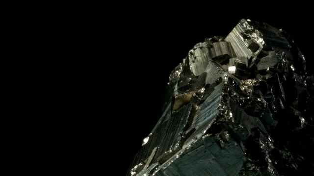 Mountain crystal . Rotates on a black background. Macro