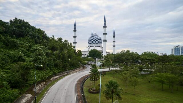 Time lapse of cloudy sunrise dawn at Masjid Shah Alam, Selangor Malaysia.