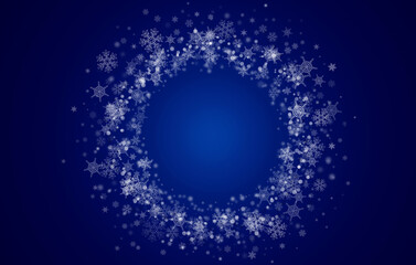 round frame of white snowflakes on a blue background