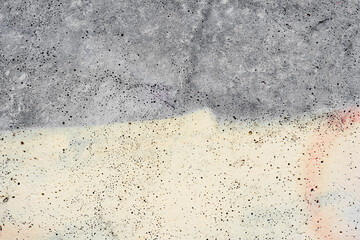Texture of a concrete wall with cracks and scratches which can be used as a background
