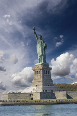 Fototapeta premium Sky colors on the background of Statue of Liberty, New York City