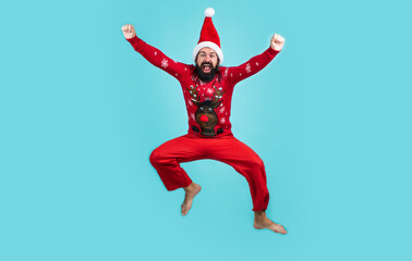 Express positivity. happy male has funny look. winter holiday party. new year fun. santa ctlaus in...