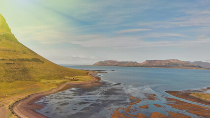 Aerial panoramic view of Kirkjufell mountain landscape in Iceland, drone viewpoint