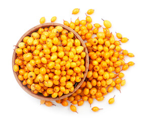 Sea buckthorn in a plate on a white background, isolated. The view from top