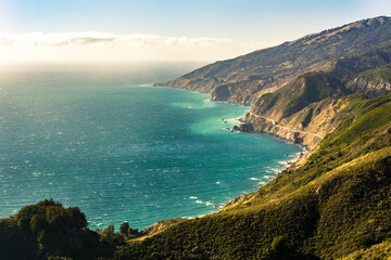 Fototapeta na wymiar High angle of Pacific Coast Highway winding along steep Big Sur coast line