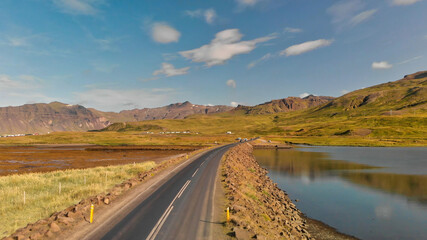 Kirkjufell Landscape and road on a beautiful sunny summer day, aerial view