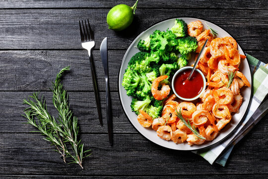 Garlic butter prawns with broccoli, top view