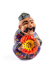 Clay figurine of a mustachioed man in a skullcap - a traditional Uzbek souvenir