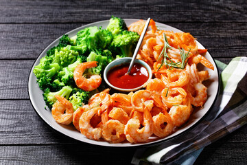 Garlic butter prawns with broccoli, top view