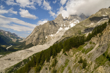 Scenic view of the massif of Mont Blanc with the Aiguille Noire de Peuterey peak and the Val Veny valley in summer, Courmayeur, Aosta Valley, Alps, Italy