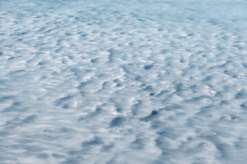 mud baths and silt in the water of a lake or river. Concept of river shallowing or therapeutic and rheumatological treatment with mineral mud at the resort