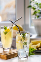 Grapefruit gin and tonic selection drink alcohol cocktail or detox water on the white table near...