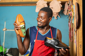 image of african man, with foot wear-workshop concept