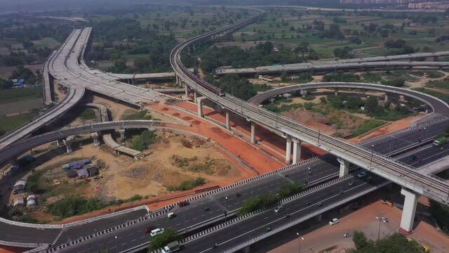 An aerial shot of the Delhi metro entering the station at Mayur Vihar,New Delhi, India