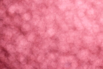 Pink bokeh background. Abstract background and texture with copy space. Vertical orientation.