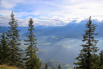 View of mountains and valley in the Alps near Hallein, Austria on a misty morning