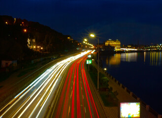 Night flow of cars on the highway