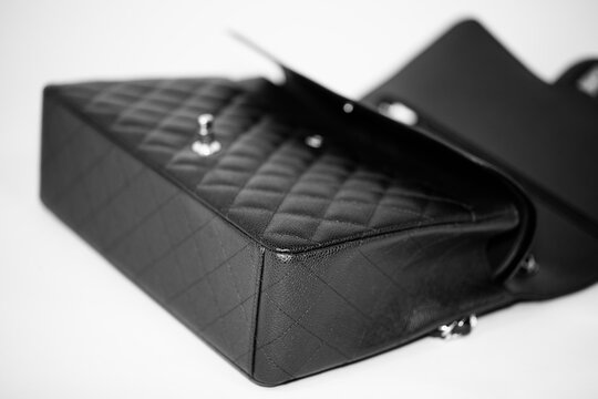 Classic black handbag on white background - Image