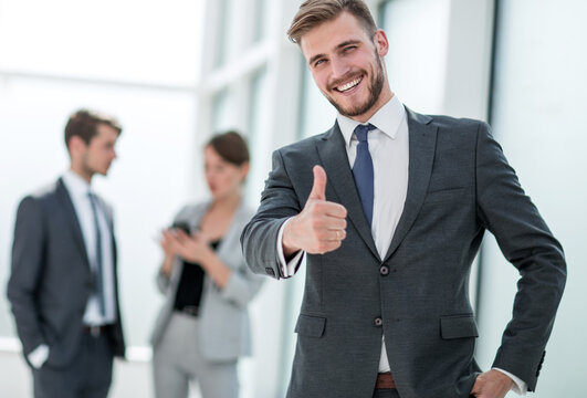 Young Businessman Showing Thumb Up.