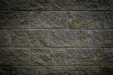 Textured Stone Brick Wall Background with Vignette