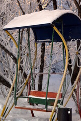 gazebo hanging swing in winter in the North of Russia