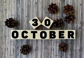 October 30.October 30 on wooden cubes.Calendar for October on a wooden background.Autumn.