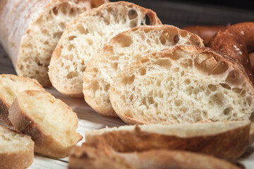 Various rustic bread on a wooden board. Healthy food and farming concept