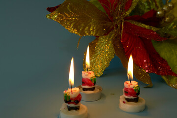 Christmas candle and balls multicolored light. Christmas concept.