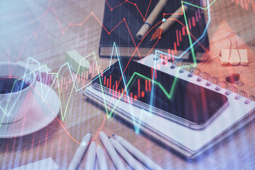 Double exposure of forex chart drawing and cell phone background. Concept of financial trading