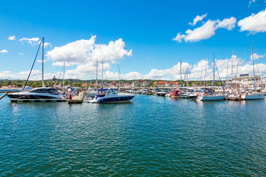 Yachts and motorboats moored in yacht haven Marina in Sopot, Poland