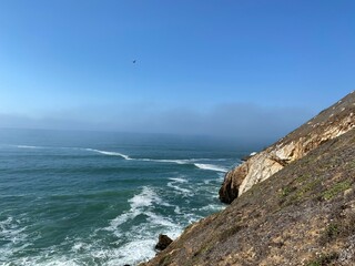 waves crashing on rocks