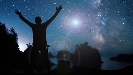 silhouette of a person in starry night landscape