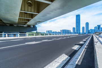 urban traffic road with cityscape in background, China.
