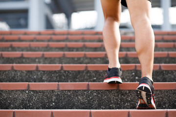 Runners are running up the stairs.