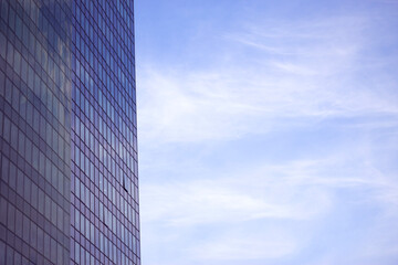 glass business center with blue sky