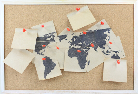 the world map on the corkboard