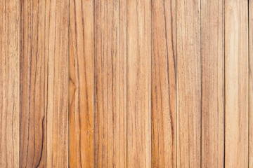 Above view of brown panel wooden texture background. Old striped wood lumber wall. Vintage board floor natural pattern. The surface of the table plank teak. Top view